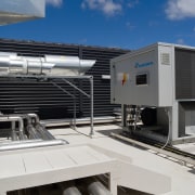 A view of a air conditioning suystem from architecture, building, gray