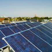 A view of  the Szencorp offices in daylighting, energy, roof, sky, solar energy, solar panel, solar power, technology, blue, gray