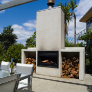 View of the precast fireplace  and exposed home, real estate, gray