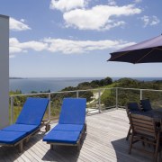 A view of a home by Creative Architecture. apartment, estate, leisure, outdoor furniture, penthouse apartment, property, real estate, resort, sea, sky, sunlounger, swimming pool, vacation, villa, gray