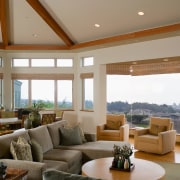 View of open plan living area with large ceiling, daylighting, estate, hardwood, home, interior design, living room, property, real estate, room, window, brown, gray