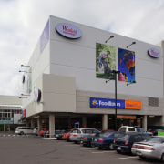 View of the 3D signs installed in the advertising, building, car, city, commercial building, mixed use, shopping mall, white, gray