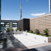 View of the outdoor cafe featuring planter boxes, apartment, architecture, building, commercial building, condominium, corporate headquarters, daylighting, facade, headquarters, mixed use, real estate, residential area, urban design, black