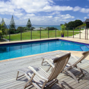 View of this concrete pool designed and manufactured condominium, estate, home, house, leisure, leisure centre, outdoor furniture, outdoor structure, property, real estate, resort, sunlounger, swimming pool, vacation, villa, water