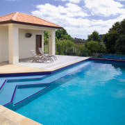 View of this concrete pool designed and manufactured estate, home, house, leisure, property, real estate, resort, swimming pool, villa, water, teal