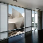 A view of Devers new Cultural Centre witch architecture, condominium, daylighting, door, glass, house, interior design, property, real estate, window, gray