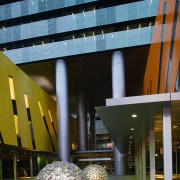 View of Brisbane square featuring bright colours, sculptured architecture, building, condominium, daylighting, daytime, facade, tourist attraction, black