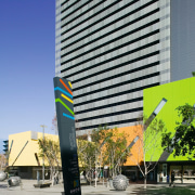 A view of the external Brisbane square sign architecture, building, city, commercial building, condominium, corporate headquarters, daytime, facade, headquarters, metropolitan area, mixed use, real estate, sky, skyscraper, tower block, tree, gray