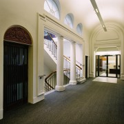 view of the 86 Customhouse Quay lobby/hallway featuring architecture, ceiling, daylighting, estate, floor, flooring, interior design, lobby, real estate, window, black, white