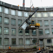 A view of Excavation, piling and construction work building, construction, demolition, gray, black, white