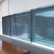 A view extrafloke blackout blinds used in office architecture, daylighting, glass, window, teal, gray