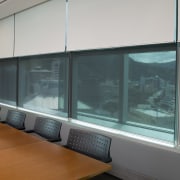 A view extrafloke blackout blinds used in office architecture, glass, interior design, window, window covering, gray