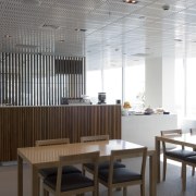 A view of the KPMG office. - A architecture, ceiling, furniture, interior design, table, white, gray