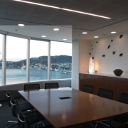 View of the modern office space areas in architecture, ceiling, conference hall, daylighting, interior design, office, window, black, gray