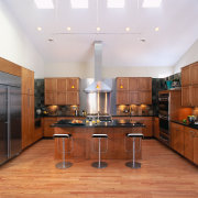 A view of this new Kitchen is enhanced cabinetry, ceiling, countertop, cuisine classique, floor, flooring, hardwood, interior design, kitchen, real estate, room, wood flooring, white