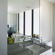 A view of the bathroom featuring  frameless architecture, bathroom, ceiling, glass, interior design, product design, sink, gray