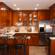 A view of this kitchen featuring solid maple cabinetry, countertop, cuisine classique, interior design, kitchen, real estate, room, brown