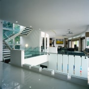 A view of the formal double height foyer, architecture, condominium, daylighting, glass, interior design, leisure centre, gray