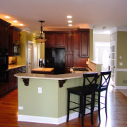 A view of this kitchen designed by Box cabinetry, countertop, cuisine classique, floor, flooring, hardwood, interior design, kitchen, room, wood flooring