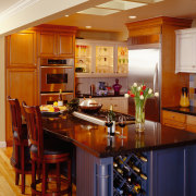 A view of a kitchen by NKBA. - cabinetry, ceiling, countertop, cuisine classique, dining room, hardwood, interior design, kitchen, room, brown