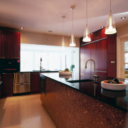 A view of this kitchen featuring terrazzo flooring, cabinetry, ceiling, countertop, interior design, kitchen, real estate, room, red, orange