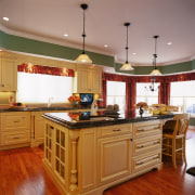 A view of decorative grapevine  cornices and cabinetry, countertop, cuisine classique, hardwood, interior design, kitchen, room, brown, gray