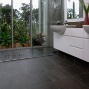 A view of some floor tiles from Impressa floor, flooring, hardwood, home, interior design, laminate flooring, property, tile, wall, window, wood, wood flooring, gray, black