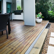 A view of a home designed by Planit deck, floor, flooring, hardwood, house, outdoor structure, wood, wood flooring, white