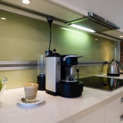 A view of a power track by Eubiq. countertop, interior design, kitchen, small appliance, gray, brown
