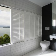 A view of some blnds and shutters from architecture, bathroom, daylighting, floor, home, house, interior design, room, window, window blind, window covering, window treatment, gray