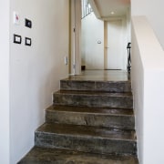 A view of some coloured concrete flooring from architecture, floor, flooring, handrail, stairs, gray, white