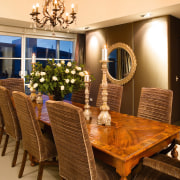 Comfortable proporations and vlean lines are evident in dining room, furniture, interior design, living room, room, table, brown, orange