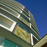 An exterior view of the Jade apartment tower angle, architecture, building, commercial building, condominium, corporate headquarters, daylighting, daytime, facade, headquarters, house, landmark, line, metropolitan area, mixed use, residential area, sky, skyscraper, tower block, blue, brown