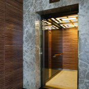 A view of the Lifts installed in the architecture, bathroom, floor, flooring, interior design, tile, gray, brown