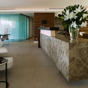 A view of this apartment featuring zMonaco Brown floor, flooring, furniture, hardwood, interior design, laminate flooring, living room, lobby, tile, wood flooring, brown, gray