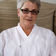 Photo of Abie Petraska - Photo of Abie eyewear, glasses, neck, person, portrait, professional, senior citizen, smile, textile, vision care, white, brown, gray