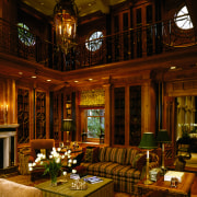 A view of the wood pannelled library/family room estate, home, interior design, living room, lobby, room, window, wood, brown, red