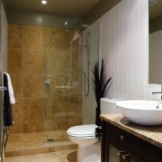 A view of some bathroomware from Newline Bathroomware. bathroom, floor, flooring, home, interior design, plumbing fixture, room, tile, wall, brown, gray