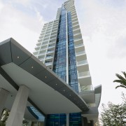 An exterior view of the Artique apartment complex apartment, architecture, building, commercial building, condominium, corporate headquarters, daytime, headquarters, metropolitan area, mixed use, real estate, residential area, sky, skyscraper, tower block, white