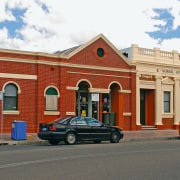 A view of an exterior restoration carried out architecture, building, car, city, downtown, facade, family car, house, landmark, metropolitan area, neighbourhood, property, real estate, residential area, sky, town, vehicle