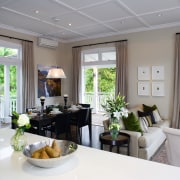 A view of some renovations built by Yellowfox. home, interior design, living room, real estate, room, window, gray