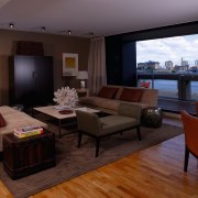 A view of the living area in this home, interior design, living room, real estate, room, suite, black