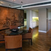 A view of the living area in this ceiling, floor, flooring, interior design, living room, lobby, room, wall, wood flooring, brown, gray