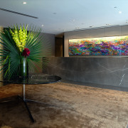 A view of the stamford apartment complex lobby floor, glass, interior design, lobby, wall, gray, black