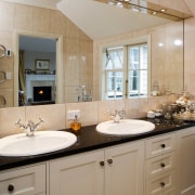 View of a bathroom vanity with twin integrated bathroom, bathroom accessory, bathroom cabinet, cabinetry, countertop, cuisine classique, floor, home, interior design, kitchen, room, sink, gray, brown