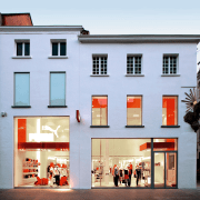 An exterior viow of the puma shopfront,  architecture, building, facade, house, window, teal