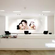 An interior view of the Puma outlet store floor, flooring, furniture, interior design, product design, room, shelf, gray
