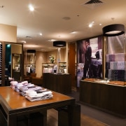 An interior view of the Rhodes &amp; beckett boutique, ceiling, interior design, black, brown