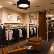 An interior view of the Rhodes &amp; beckett boutique, interior design, retail, brown, black