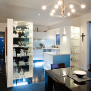 A view of this kitchen featuring tiled flooring, interior design, kitchen, real estate, room, gray